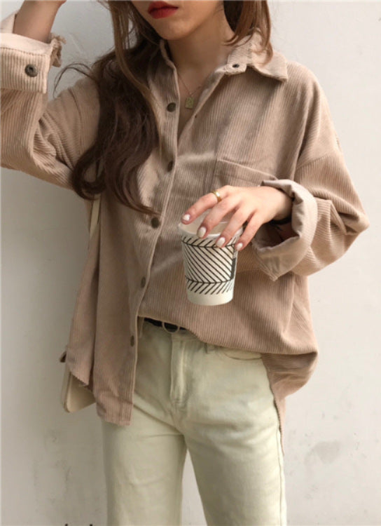 Person wearing a beige corduroy shirt holding a coffee cup against a plain background Women's Oversized Corduroy Shacket – Loose Fit Button-Down Shirt Jacket Shirt Jackets mpncm1-10.myshopify.com womens-oversized-corduroy-shacket-loose-button-down Fittyluxe