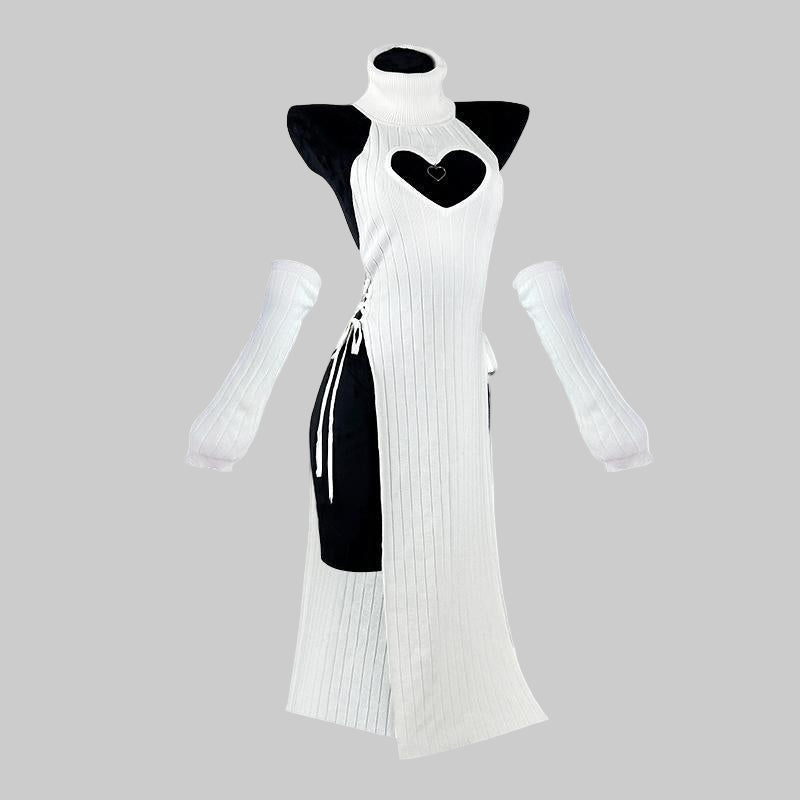 White dress with black heart design on a mannequin against a white background