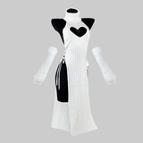 White dress with black heart design on a mannequin against a white background